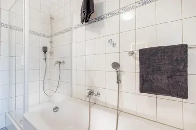 Ein Badezimmer in der Unterkunft Vulkan-Suite