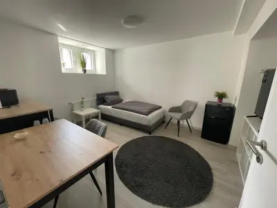 Ein Sitzbereich in der Unterkunft ABC Ferienwohnung Zimmer mit Kochmöglichkeit