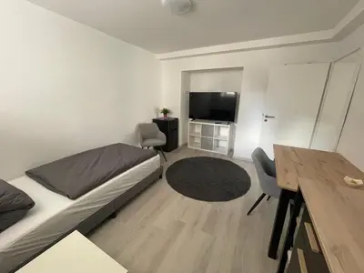 TV/Unterhaltungsangebot in der Unterkunft ABC Ferienwohnung Zimmer mit Kochmöglichkeit