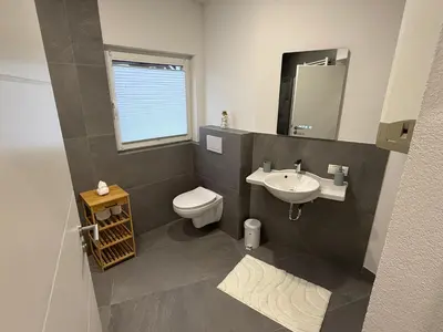 Ein Badezimmer in der Unterkunft R&A Appartments