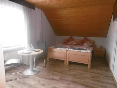 Ein Bett oder Betten in einem Zimmer der Unterkunft Haus Hochwaldhöhe