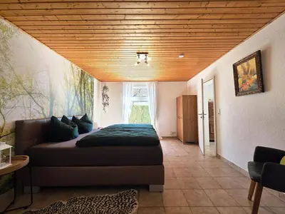 Ein Bett oder Betten in einem Zimmer der Unterkunft Nussperle