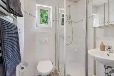 Ein Badezimmer in der Unterkunft Moderne Traumwohnung mit Traumgarten