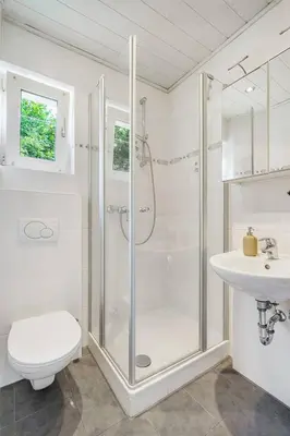 Ein Badezimmer in der Unterkunft Moderne Traumwohnung mit Traumgarten