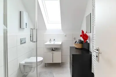 Ein Badezimmer in der Unterkunft Charming apartment in Miesenheim