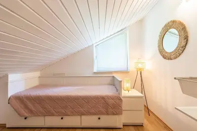 Ein Bett oder Betten in einem Zimmer der Unterkunft Luxus-Wellness-Haus am Waldsee
