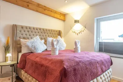 Ein Bett oder Betten in einem Zimmer der Unterkunft Modernes Scheunen-Loft