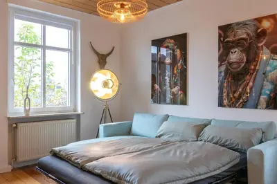 Ein Bett oder Betten in einem Zimmer der Unterkunft Altbauwohnung in Mayen im Grünen