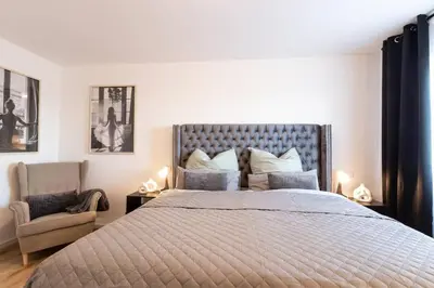 Ein Bett oder Betten in einem Zimmer der Unterkunft Apartment close to nature with balcony view