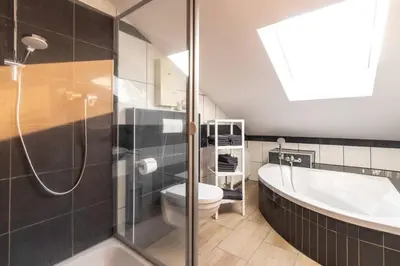 Ein Badezimmer in der Unterkunft Apartment close to nature with balcony view