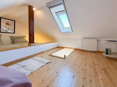 Ein Bett oder Betten in einem Zimmer der Unterkunft Wohnen mit Weitblick-Eifel pur
