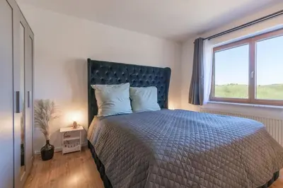 Ein Bett oder Betten in einem Zimmer der Unterkunft Living between heaven and forest