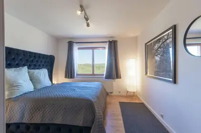 Ein Bett oder Betten in einem Zimmer der Unterkunft Living between heaven and forest