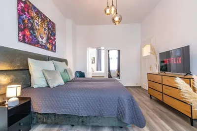 Ein Bett oder Betten in einem Zimmer der Unterkunft Design-Altbaujuwel in Neuwied