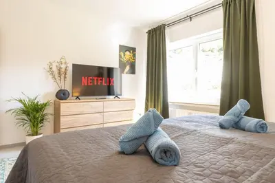 Ein Bett oder Betten in einem Zimmer der Unterkunft Romantische Wohnung in der Moselregion