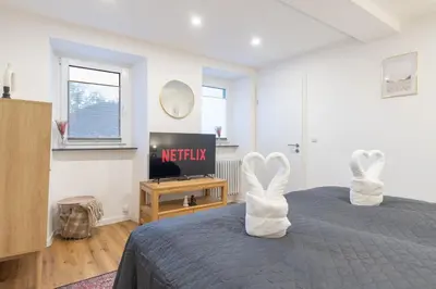 Ein Bett oder Betten in einem Zimmer der Unterkunft Uferglück Apartment an der Mosel