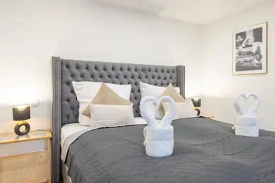 Ein Bett oder Betten in einem Zimmer der Unterkunft Uferglück Apartment an der Mosel