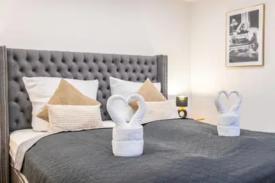 Ein Bett oder Betten in einem Zimmer der Unterkunft Uferglück Apartment an der Mosel
