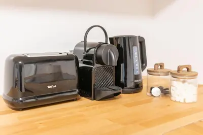 Kaffee-/Teezubehör in der Unterkunft Mosel Liebe, Modernes Apartment mit Moselblick