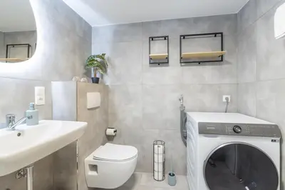Ein Badezimmer in der Unterkunft Mosel Liebe, Modernes Apartment mit Moselblick