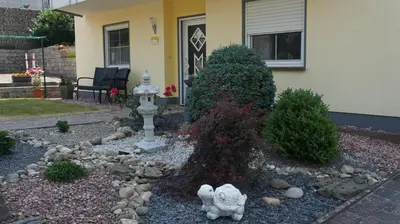 Ein Garten an der Unterkunft Ferienwohnung Hunsrücknest