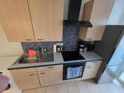 Küche/Küchenzeile in der Unterkunft Cozy city apartment Neuwied
