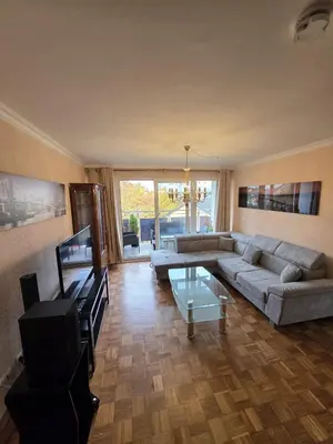 Ein Sitzbereich in der Unterkunft Cozy city apartment Neuwied