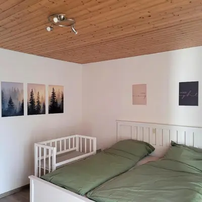 Ein Bett oder Betten in einem Zimmer der Unterkunft Familiennest-Eifel