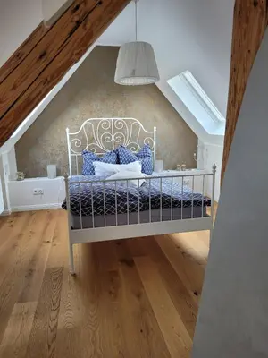 Ein Bett oder Betten in einem Zimmer der Unterkunft Ferienhaus Anne