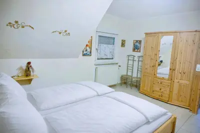 Ein Bett oder Betten in einem Zimmer der Unterkunft Movika