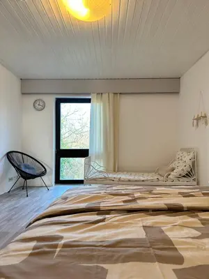 Ein Bett oder Betten in einem Zimmer der Unterkunft Luxury Wellness Villa mit Schlossblick - Sauna & Whirlpool
