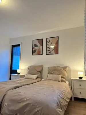 Ein Bett oder Betten in einem Zimmer der Unterkunft Luxury Wellness Villa mit Schlossblick - Sauna & Whirlpool