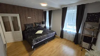 Ein Bett oder Betten in einem Zimmer der Unterkunft Geluk in Bettingen 2
