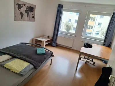 Ein Bett oder Betten in einem Zimmer der Unterkunft Big privat Zimmer 5 min walk from Railstation