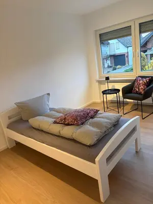 Ein Bett oder Betten in einem Zimmer der Unterkunft Moselfreunde Ellenz-Poltersdorf