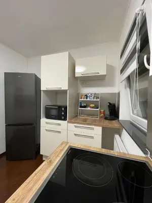 Küche/Küchenzeile in der Unterkunft Gemütliches DG-Apartment in Weißenthurm, Wohnung 4