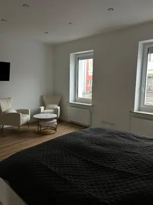 Ein Bett oder Betten in einem Zimmer der Unterkunft Gemütliches Zimmer im Herzen der Stadt Neuwied