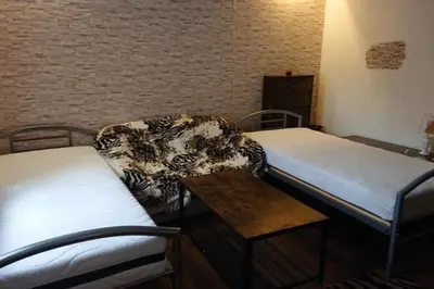 Ein Bett oder Betten in einem Zimmer der Unterkunft FeWo Orchideenzauber