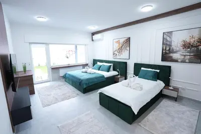 Ein Bett oder Betten in einem Zimmer der Unterkunft Luxury Apartments - Wohnung IC - Familienfreundliches