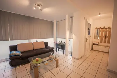 Ein Sitzbereich in der Unterkunft Ferienwohnung Keppeln
