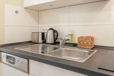 Küche/Küchenzeile in der Unterkunft RheinGold Apartment I Bingen City