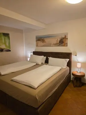 Ein Bett oder Betten in einem Zimmer der Unterkunft Gästenzimmer Louis