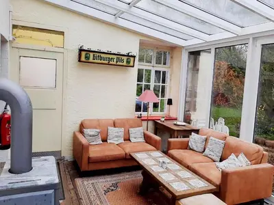 Ein Sitzbereich in der Unterkunft Eifel Garden Villa for Groups