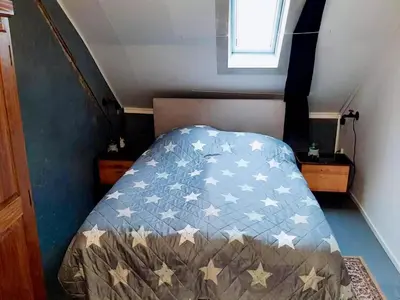 Ein Bett oder Betten in einem Zimmer der Unterkunft Eifel Garden Villa for Groups