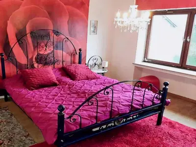 Ein Bett oder Betten in einem Zimmer der Unterkunft Eifel Garden Villa for Groups