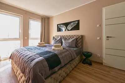 Ein Bett oder Betten in einem Zimmer der Unterkunft Abbey View Suites