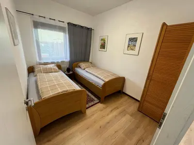 Ein Bett oder Betten in einem Zimmer der Unterkunft Safran Ferienwohnung