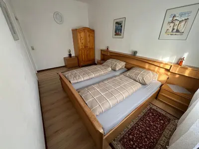 Ein Bett oder Betten in einem Zimmer der Unterkunft Safran Ferienwohnung