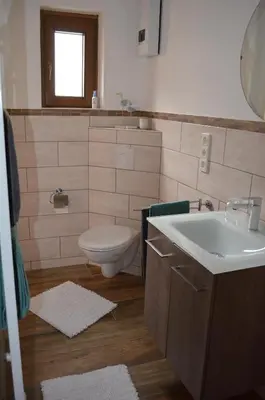 Ein Badezimmer in der Unterkunft Ferienwohnungen Felten in Minheim