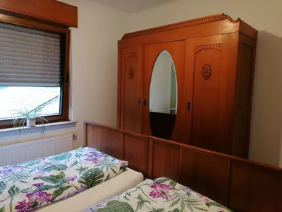 Ein Bett oder Betten in einem Zimmer der Unterkunft Ferienwohnungen Felten in Minheim